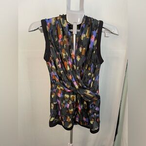 CAbi Flaunt Leopard Print Faux Wrap Blouse size XS‎